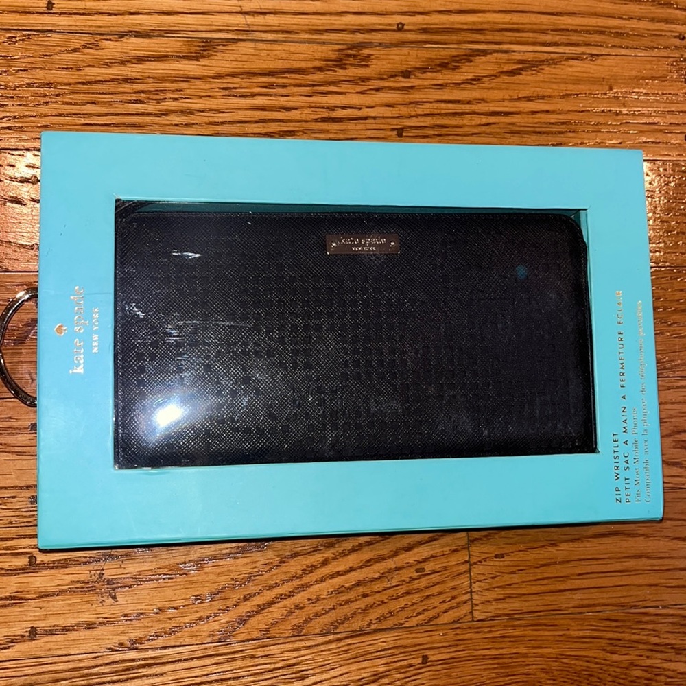 New with tags Kate Spade black zip around wallet